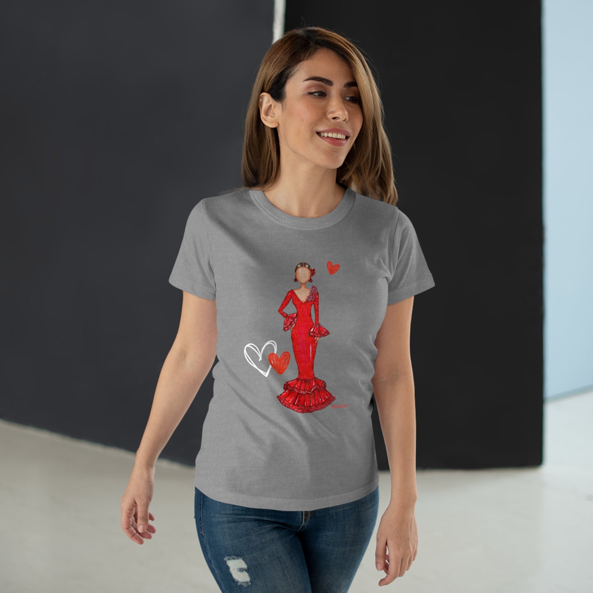 a woman wearing a grey t - shirt with a red dress and heart on it