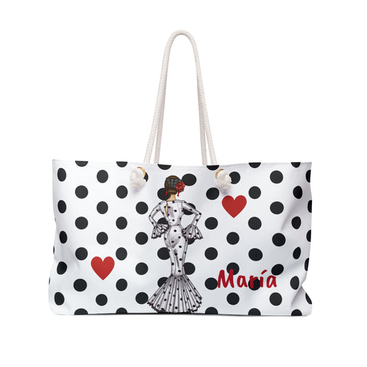 a polka dot bag with a woman on it