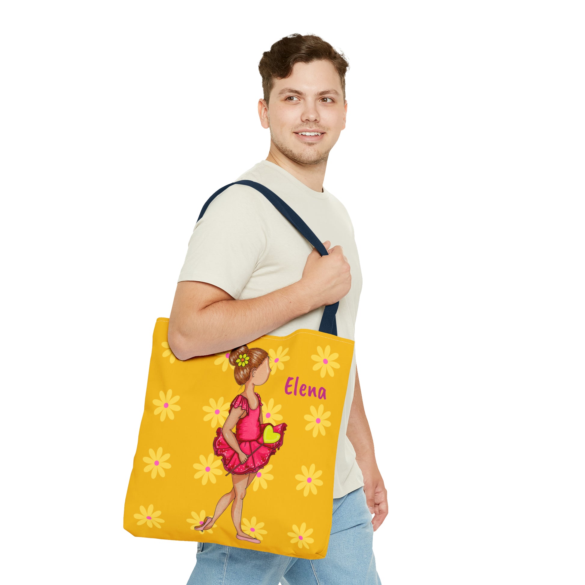 a man holding a yellow bag with a picture of a woman on it