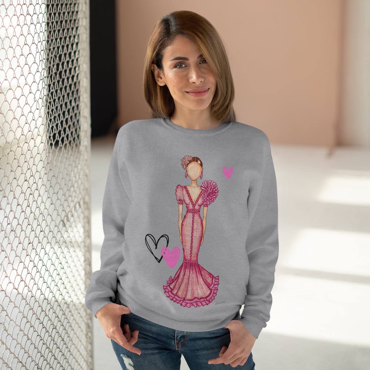 a woman wearing a sweater with a drawing of a woman in a dress