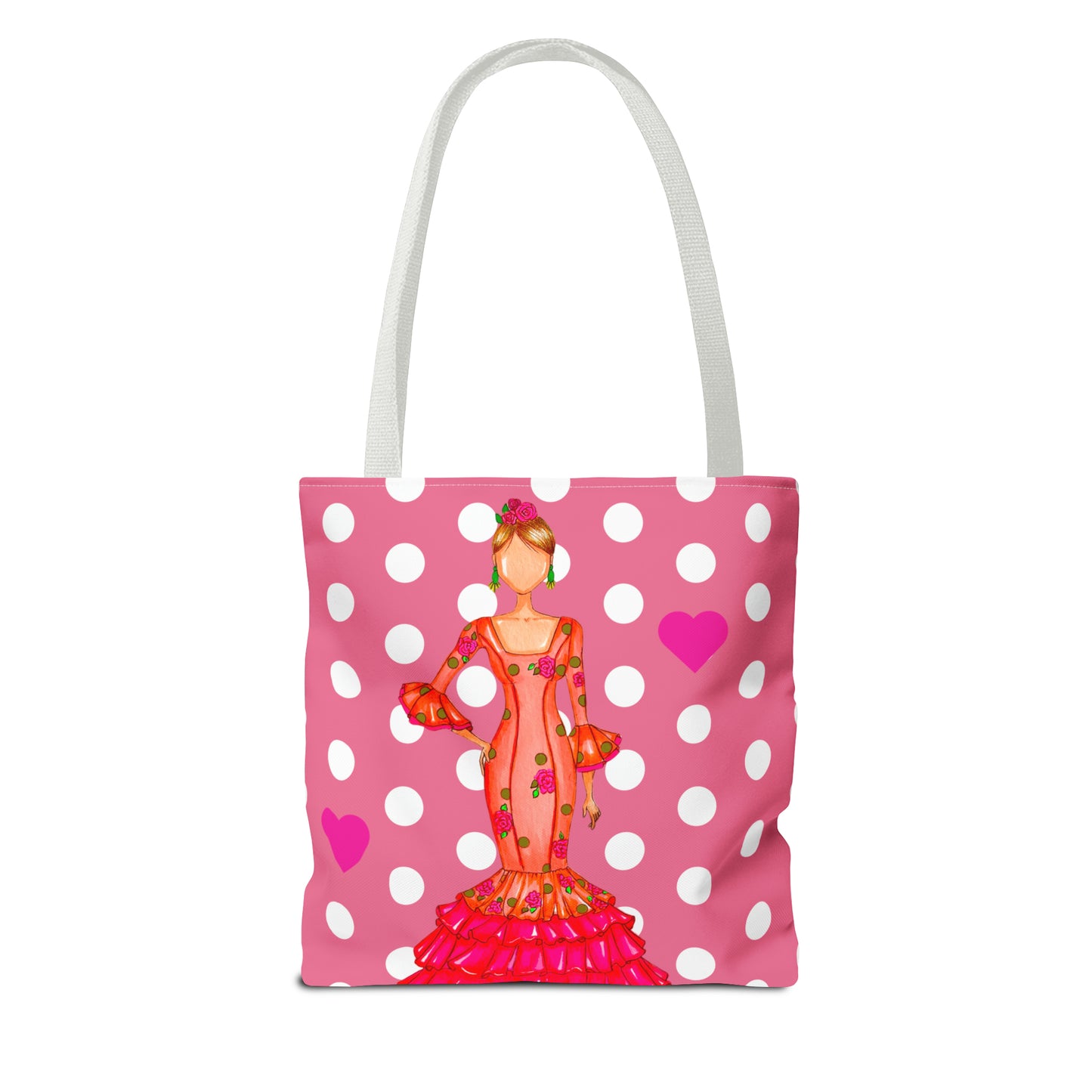 a pink polka dot bag with a picture of a woman on it