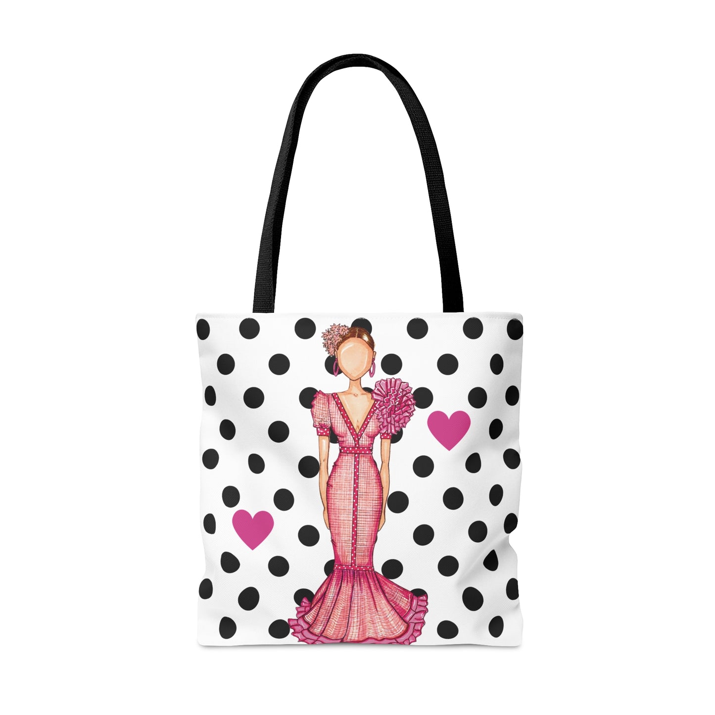 a polka dot bag with a woman in a pink dress