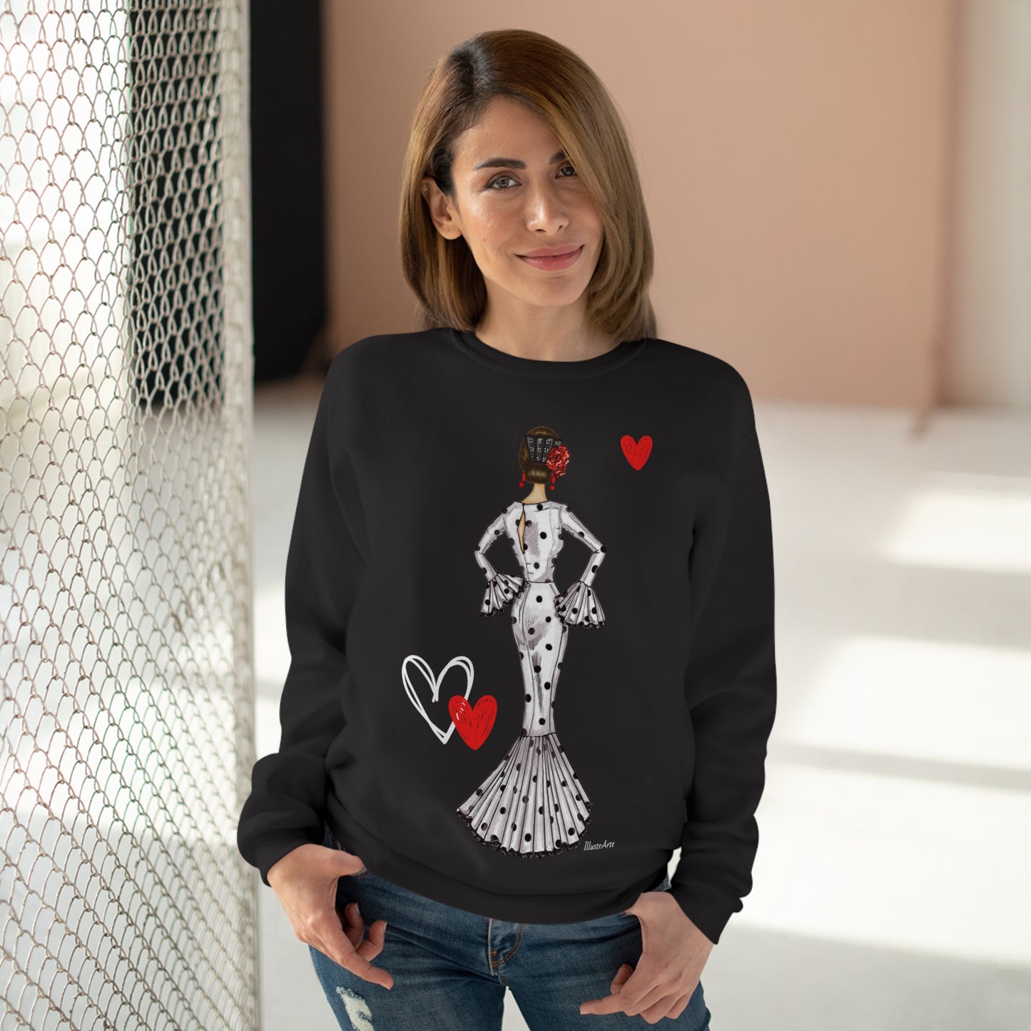 a woman wearing a sweater with a picture of a woman on it