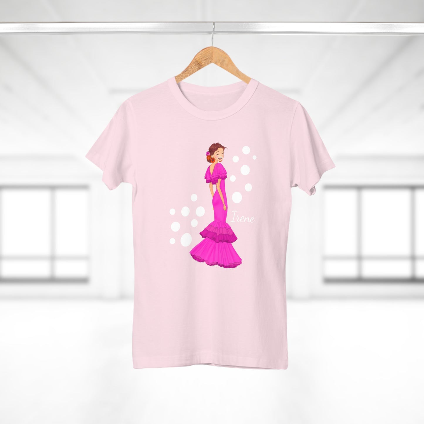 a pink t - shirt with a picture of a woman in a pink dress