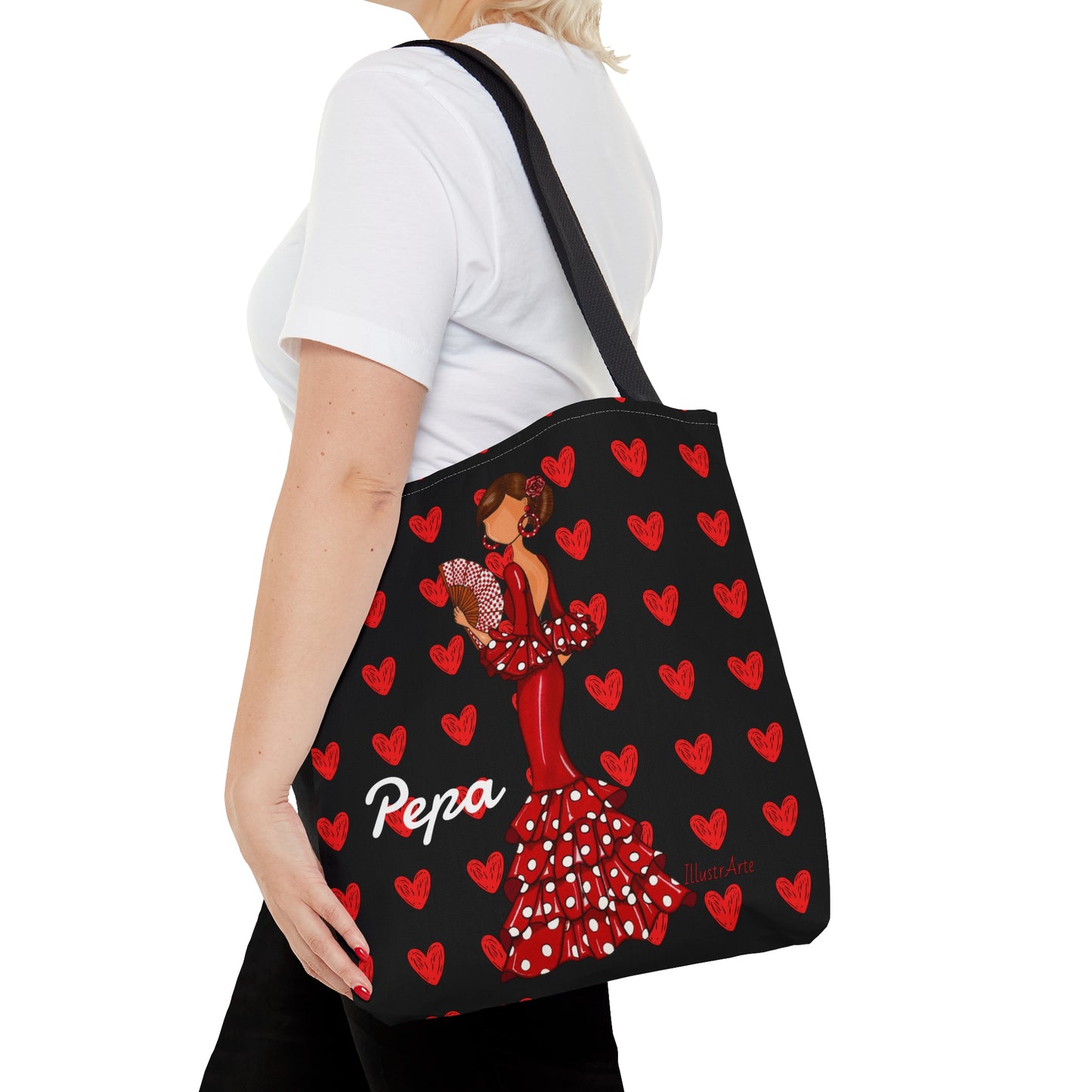 a woman carrying a large bag with hearts on it
