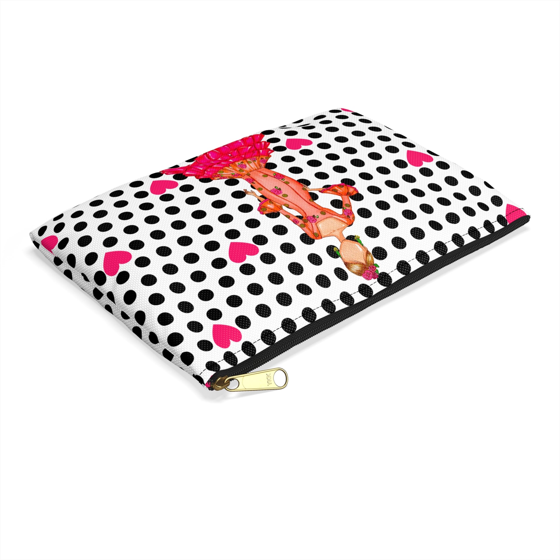a black and white polka dot notebook with a girl on it