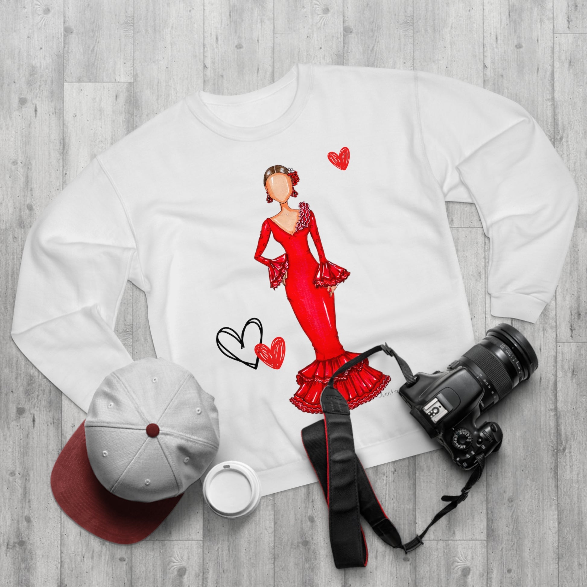 a white shirt with a picture of a woman in a red dress