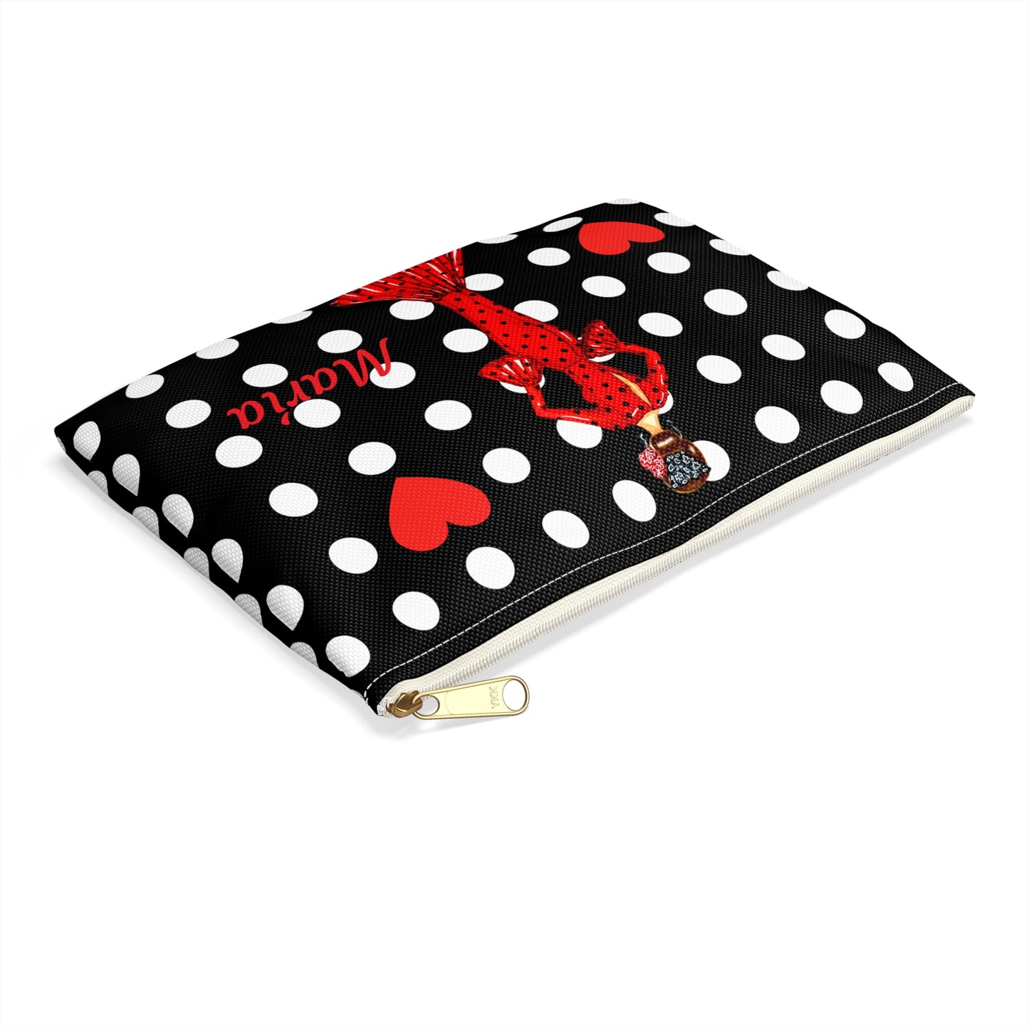 a black and white polka dot bag with a red dragon on it