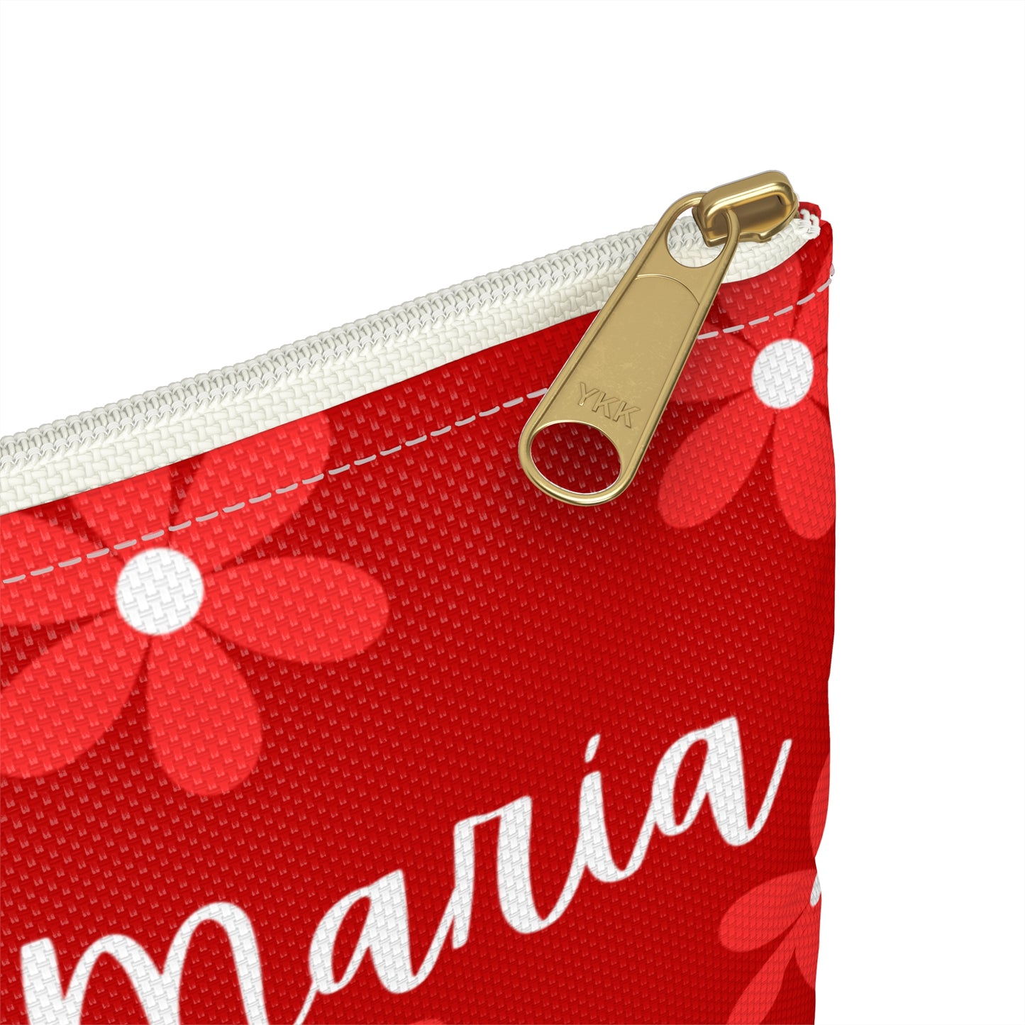 a red and white zippered pouch with a name on it