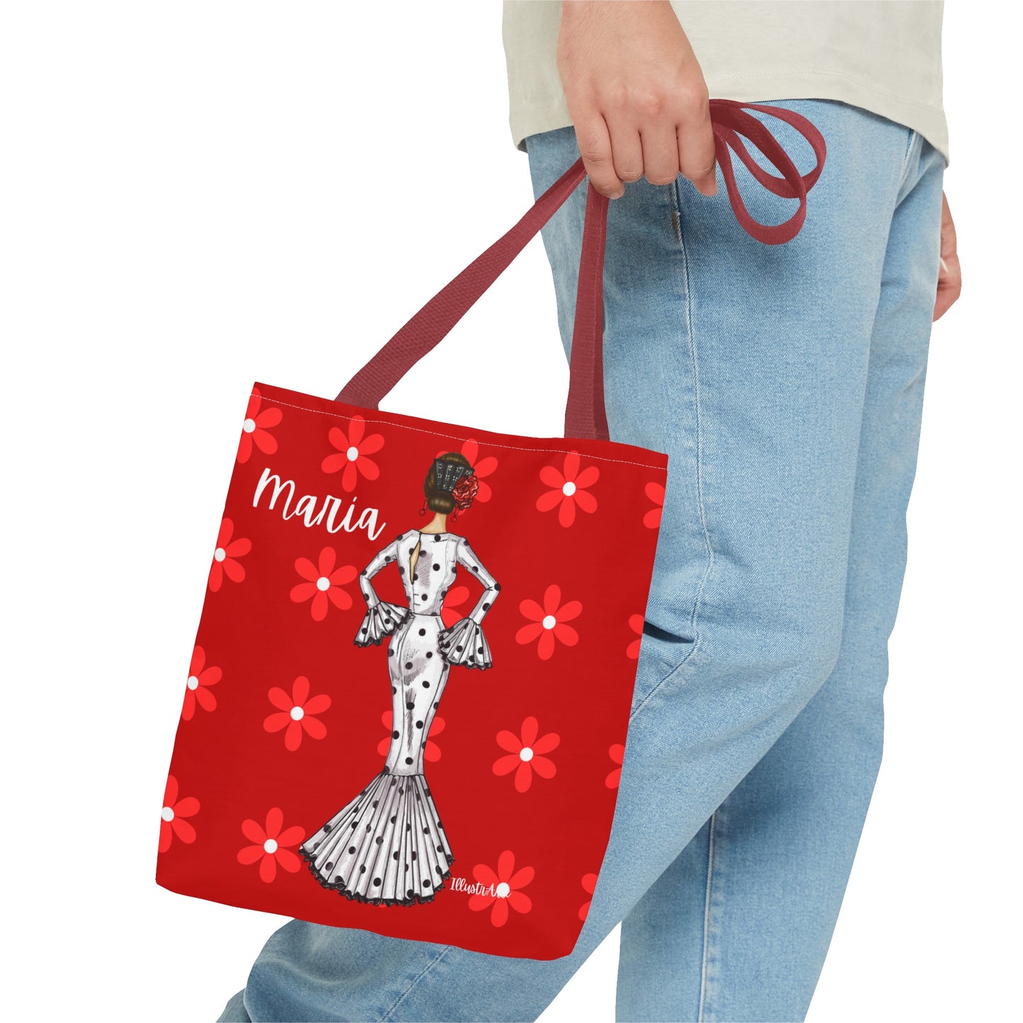 a woman carrying a red shopping bag with a picture of a woman on it