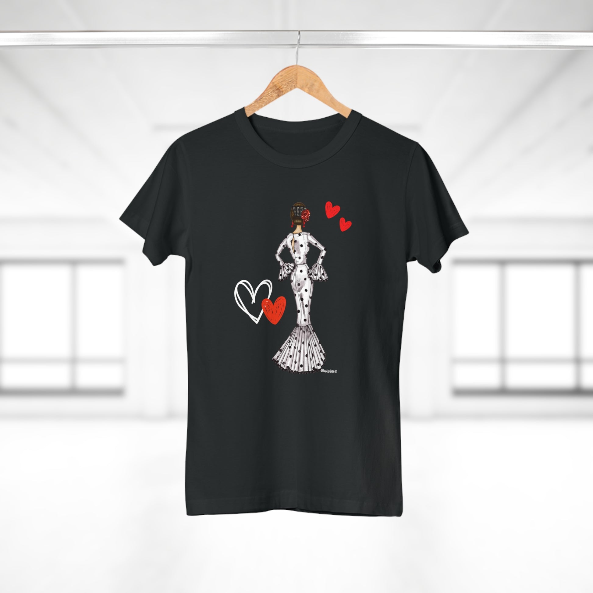 a black t - shirt with a woman holding a heart