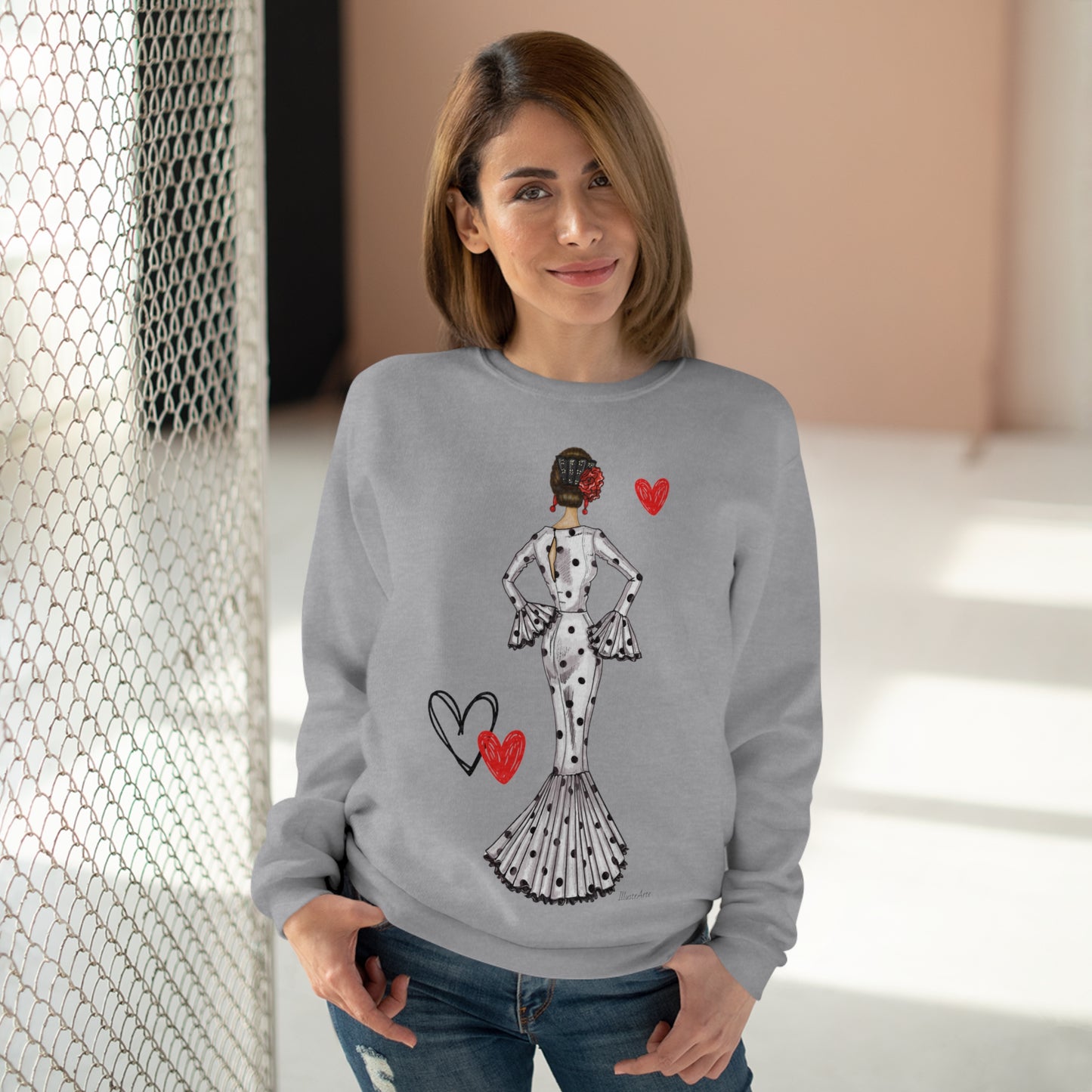 a woman wearing a sweater with a picture of a woman on it