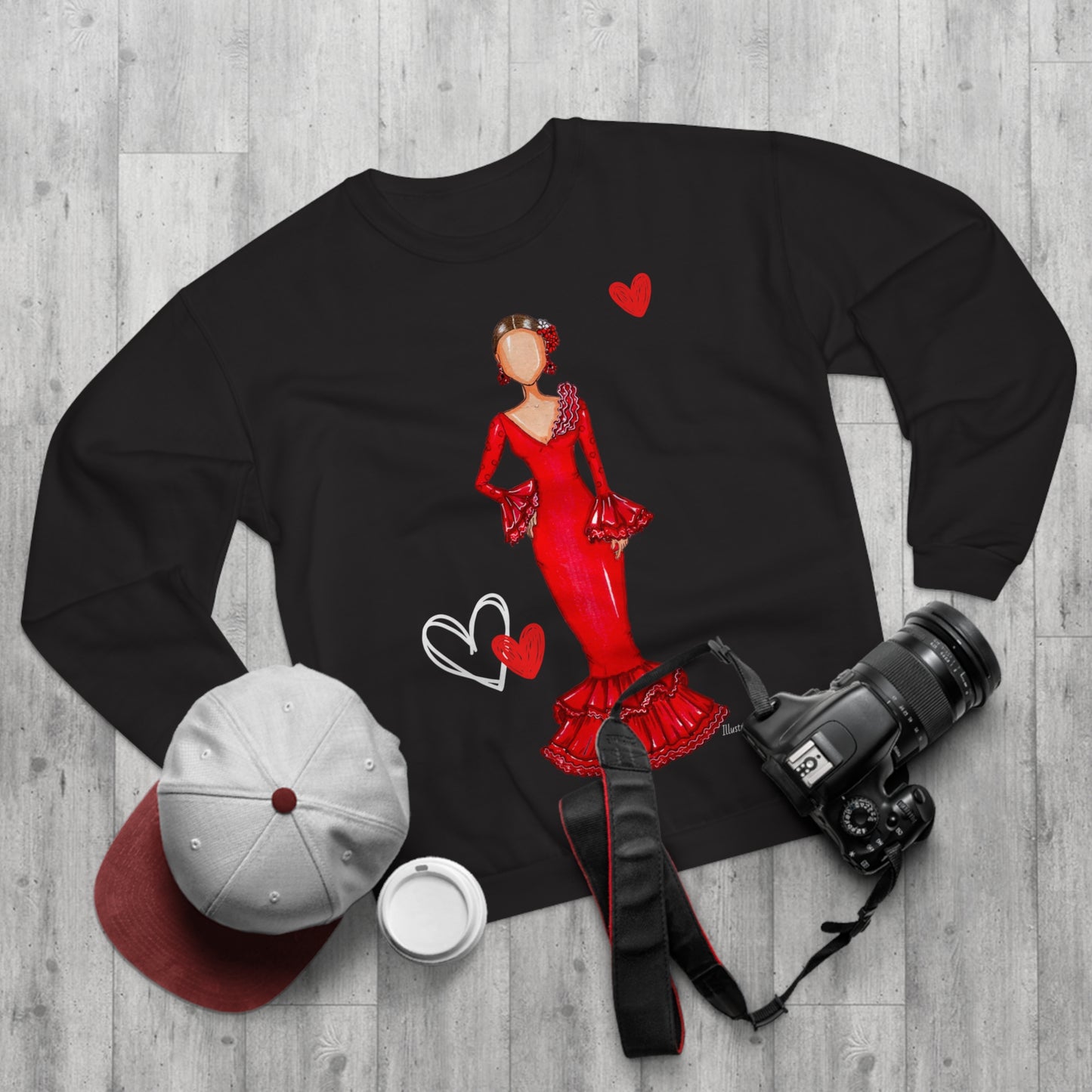 a black shirt with a picture of a woman in a red dress