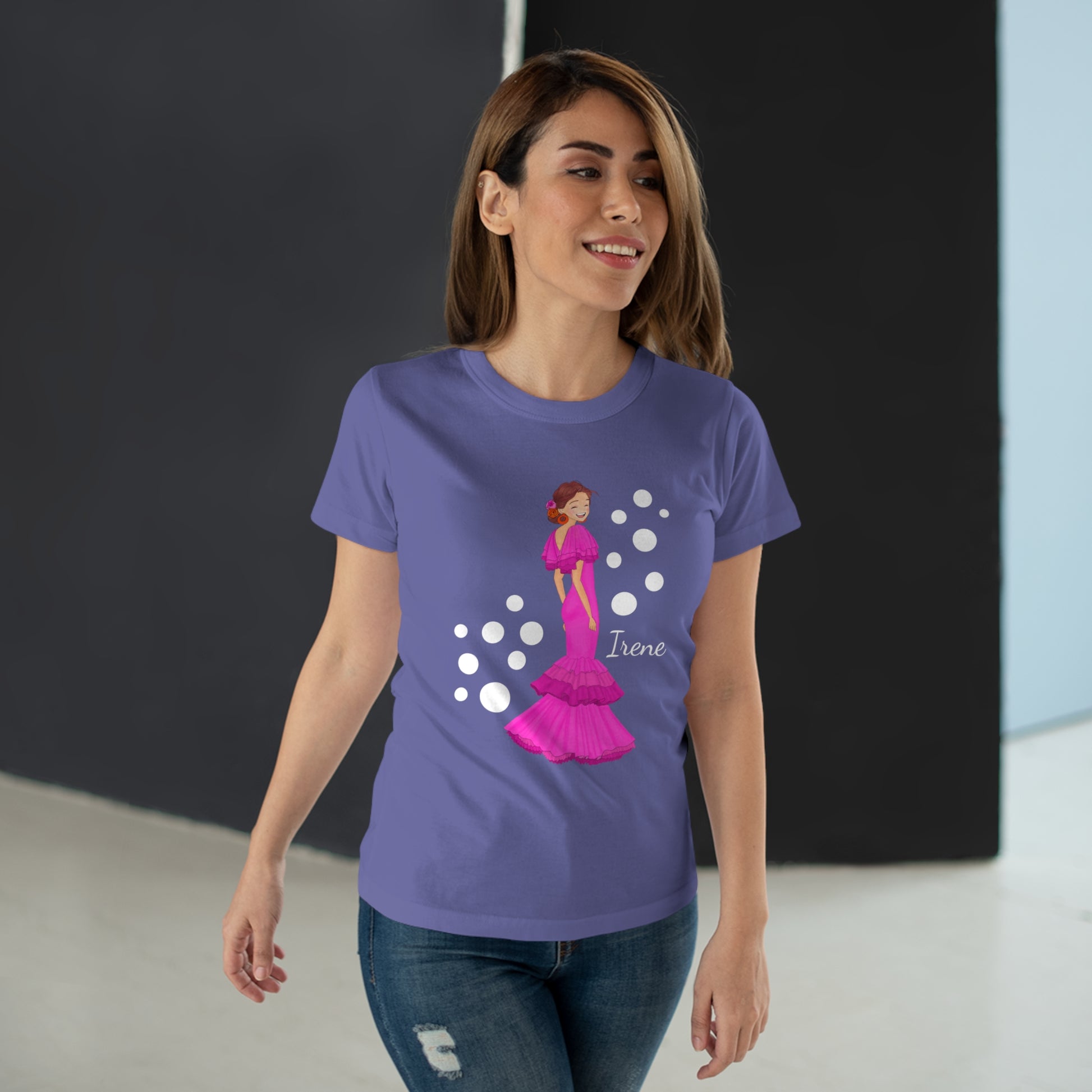a woman wearing a purple t - shirt with a picture of a princess on it