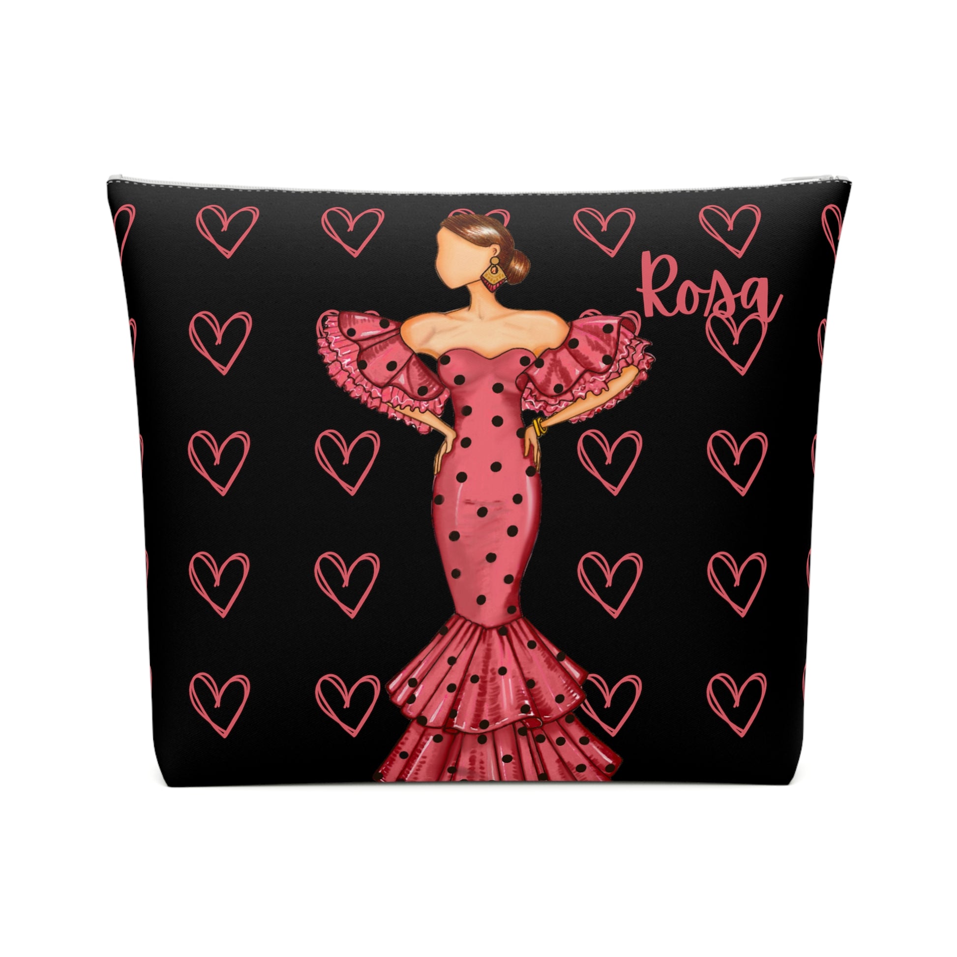 a black and pink pillow with a woman in a pink dress