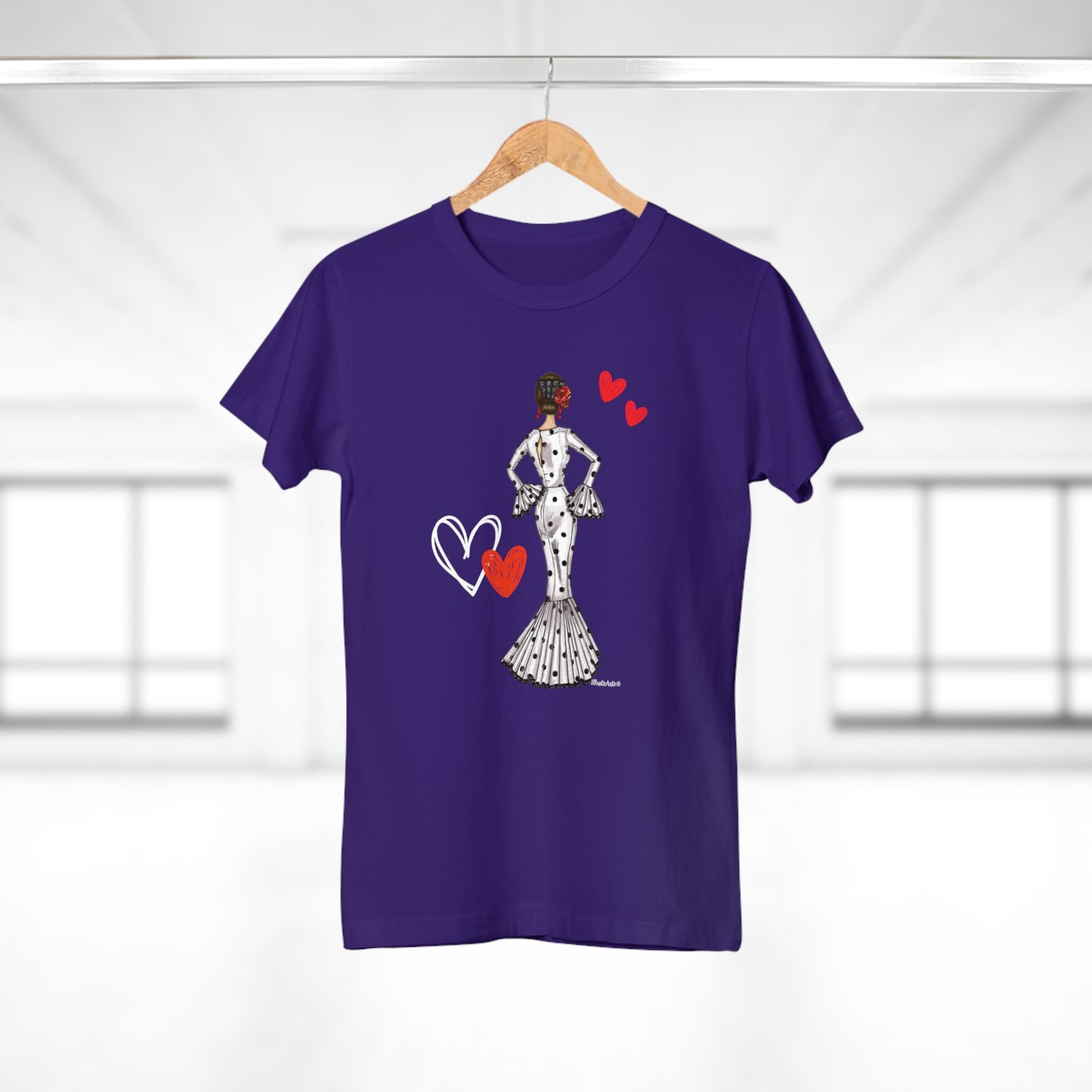 a purple t - shirt with a picture of a woman holding a heart