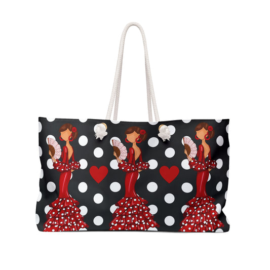 a black and white polka dot bag with a woman in a red dress