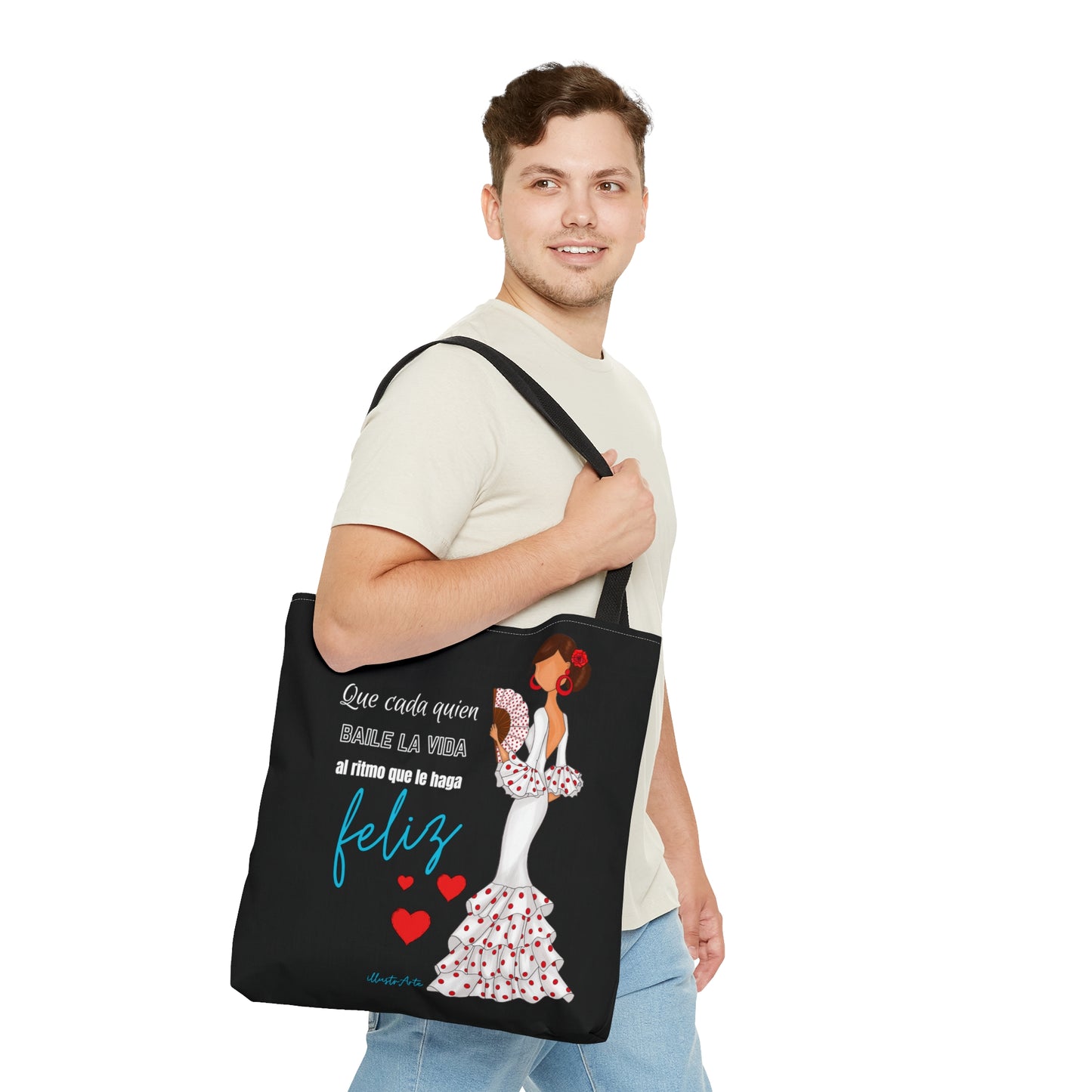 a man carrying a black tote bag with a picture of a woman