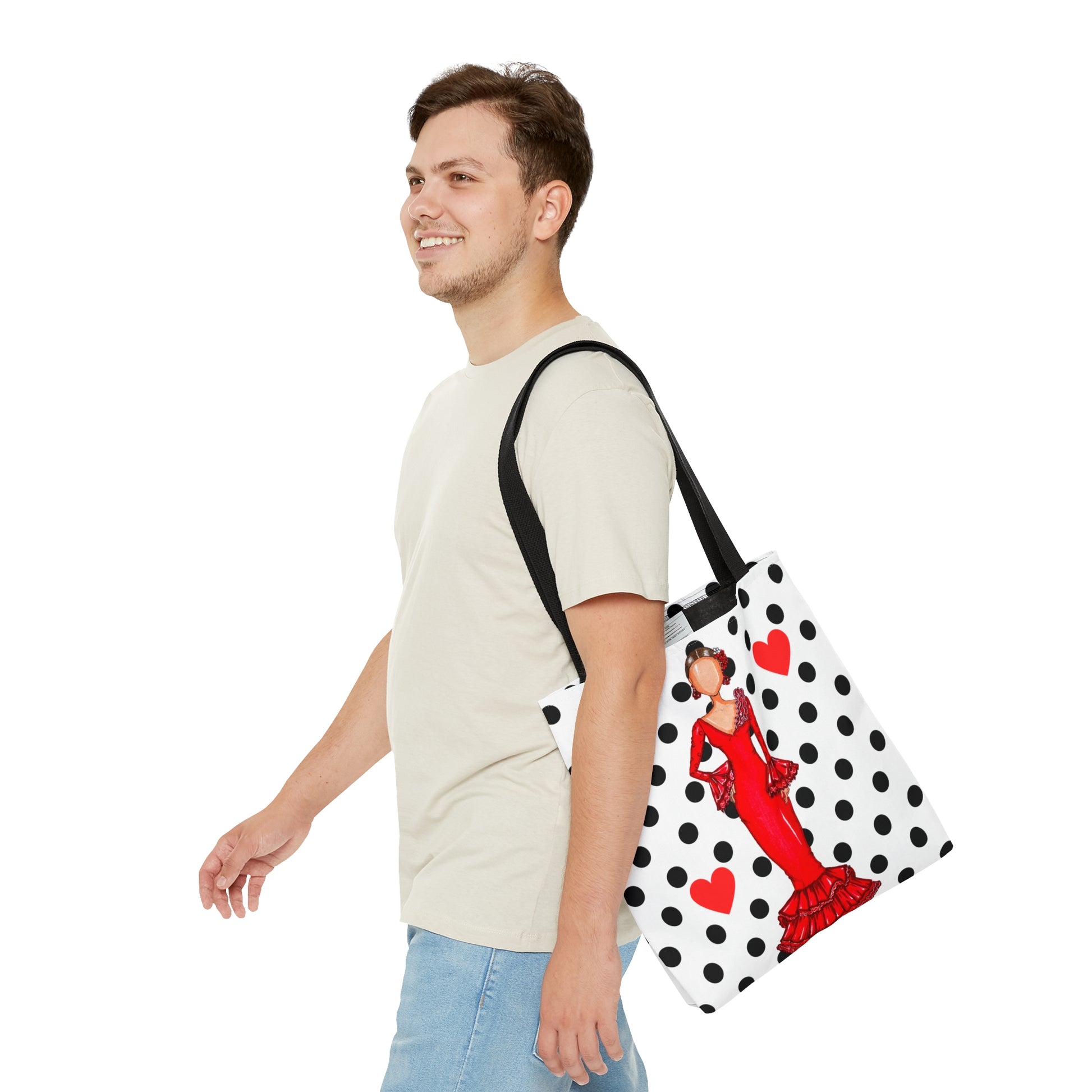 a man walking with a polka dot bag