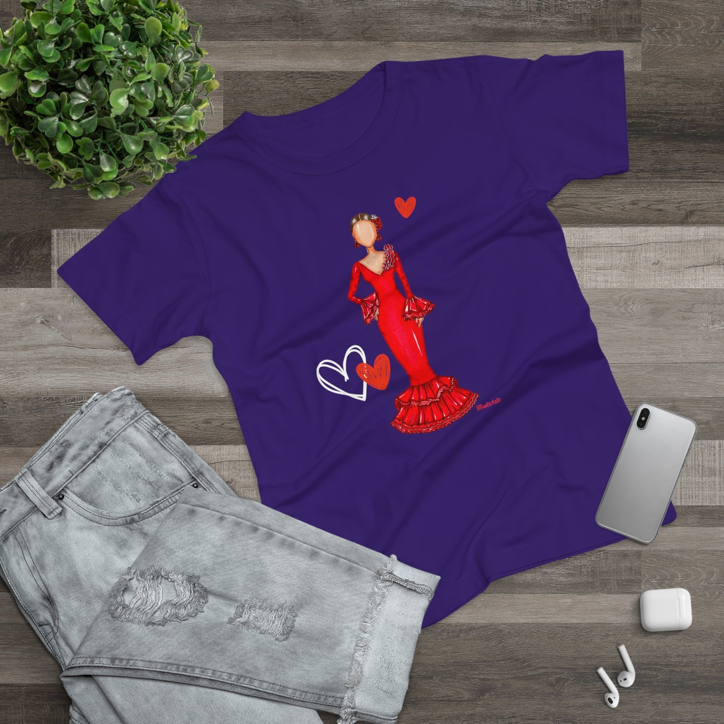 a purple shirt with a picture of a woman in a red dress