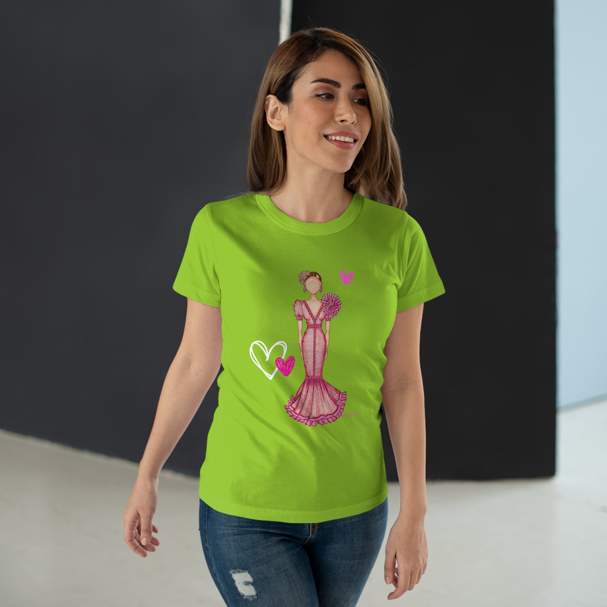 a woman wearing a green t - shirt with a pink dress on it