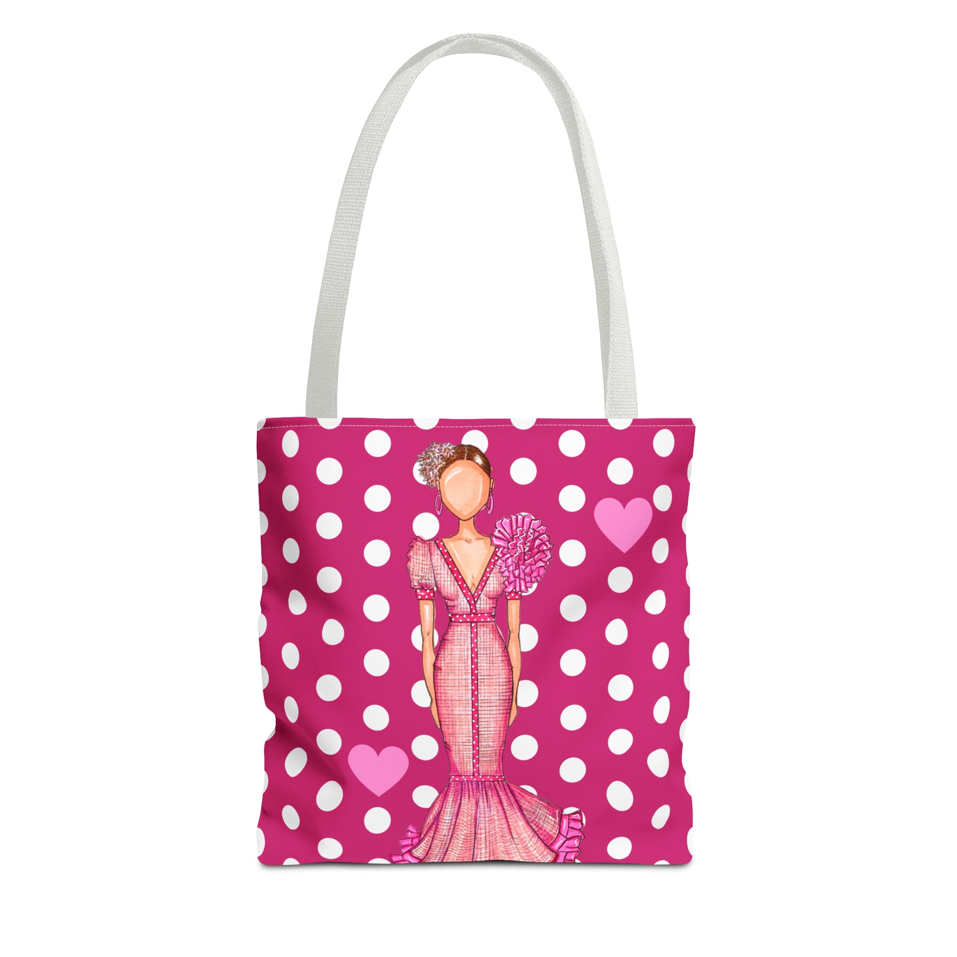 a pink and white polka dot bag with a woman in a pink dress