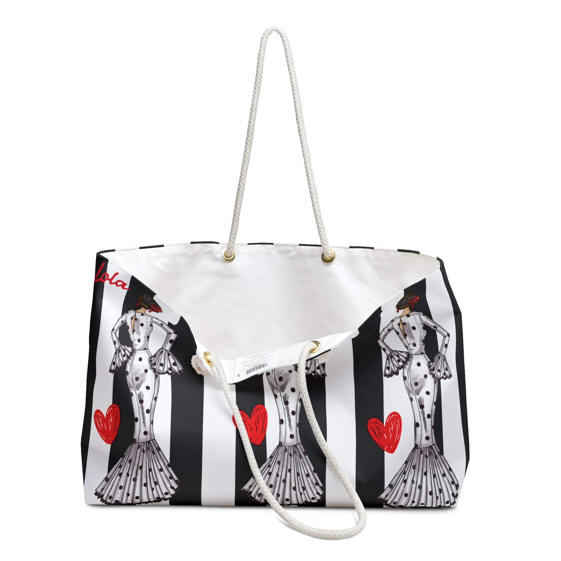 a white and black striped bag with a picture of a woman on it