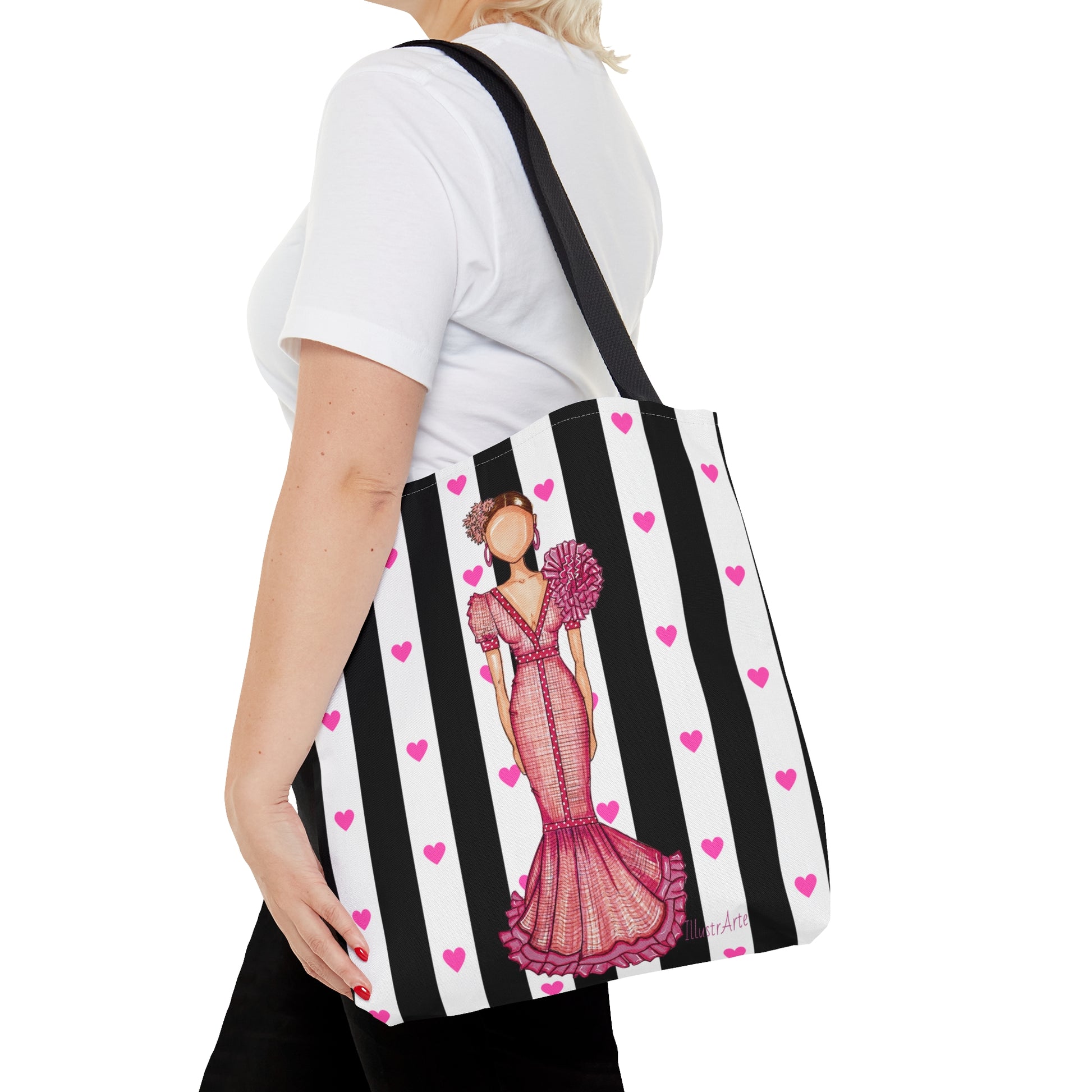 a woman carrying a black and white striped purse