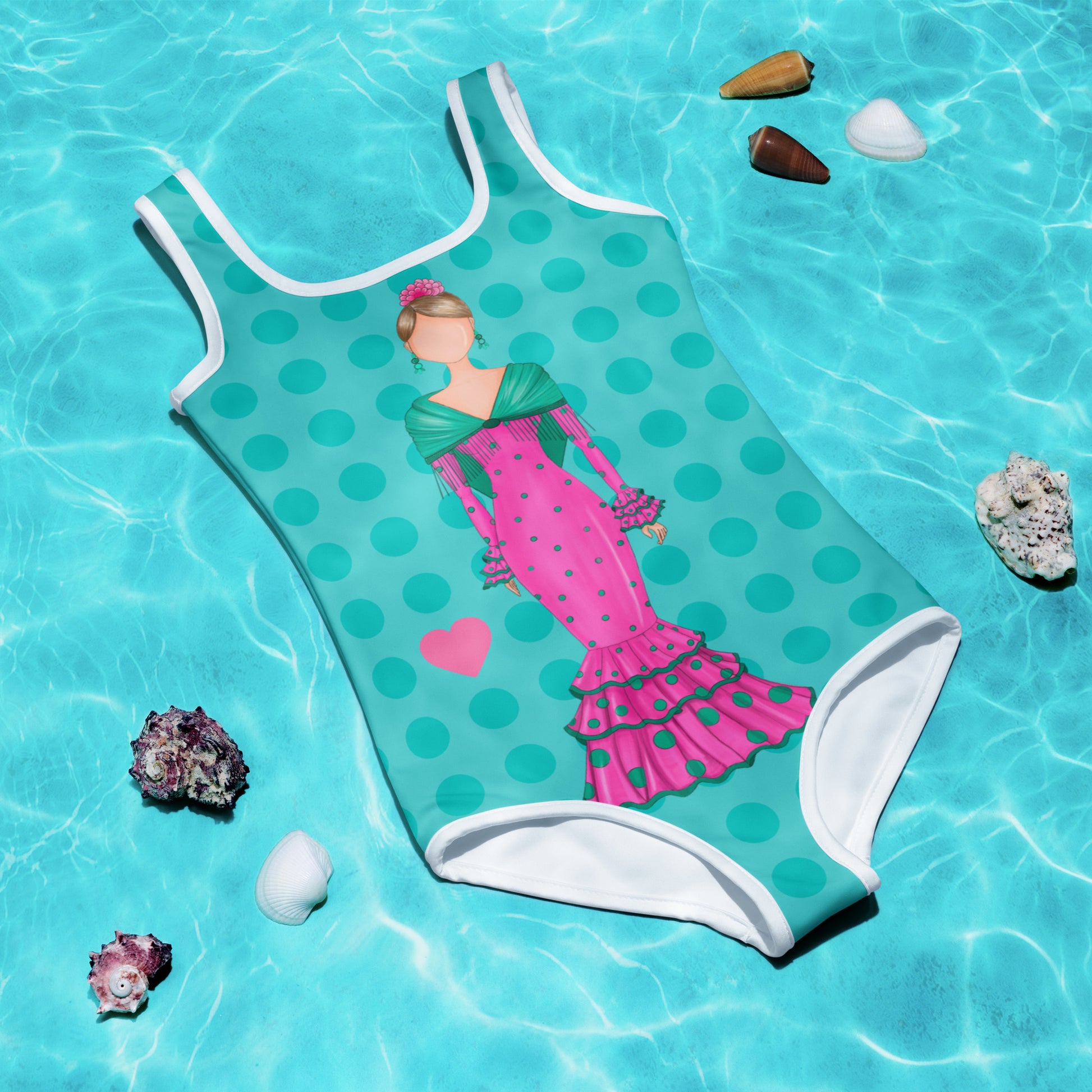 a girl's swimsuit with a picture of a woman in a pink dress