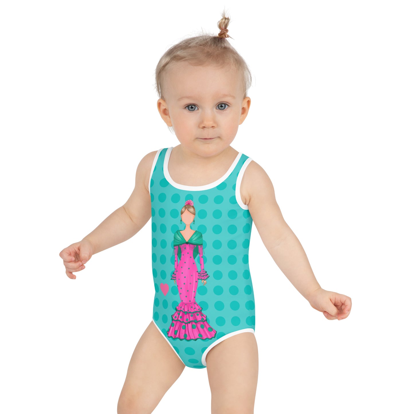 a baby girl wearing a blue and pink swimsuit