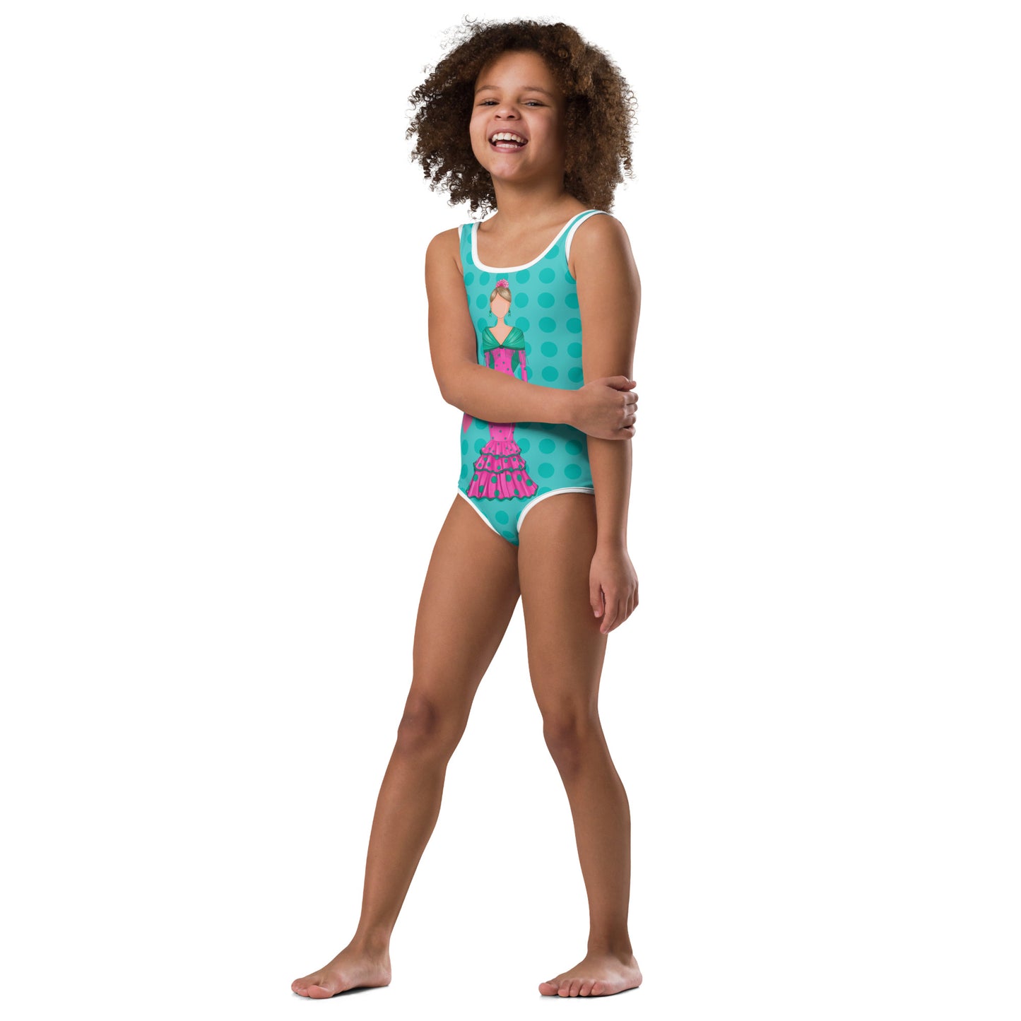a little girl in a blue and pink swimsuit
