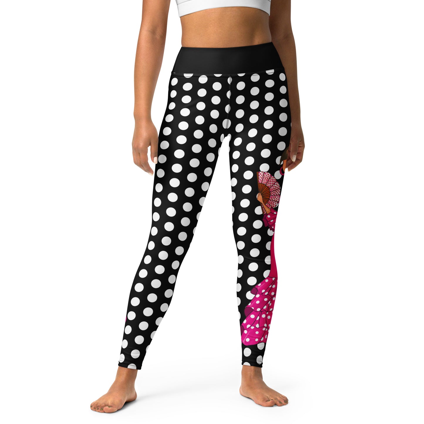 a women's leggings with polka dots and a pink flower