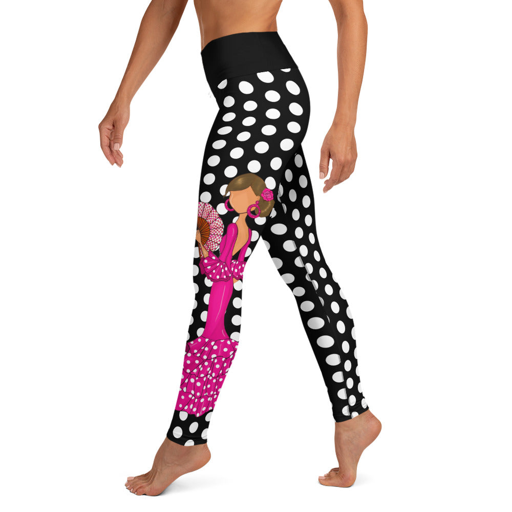 a woman in black and white polka dot leggings