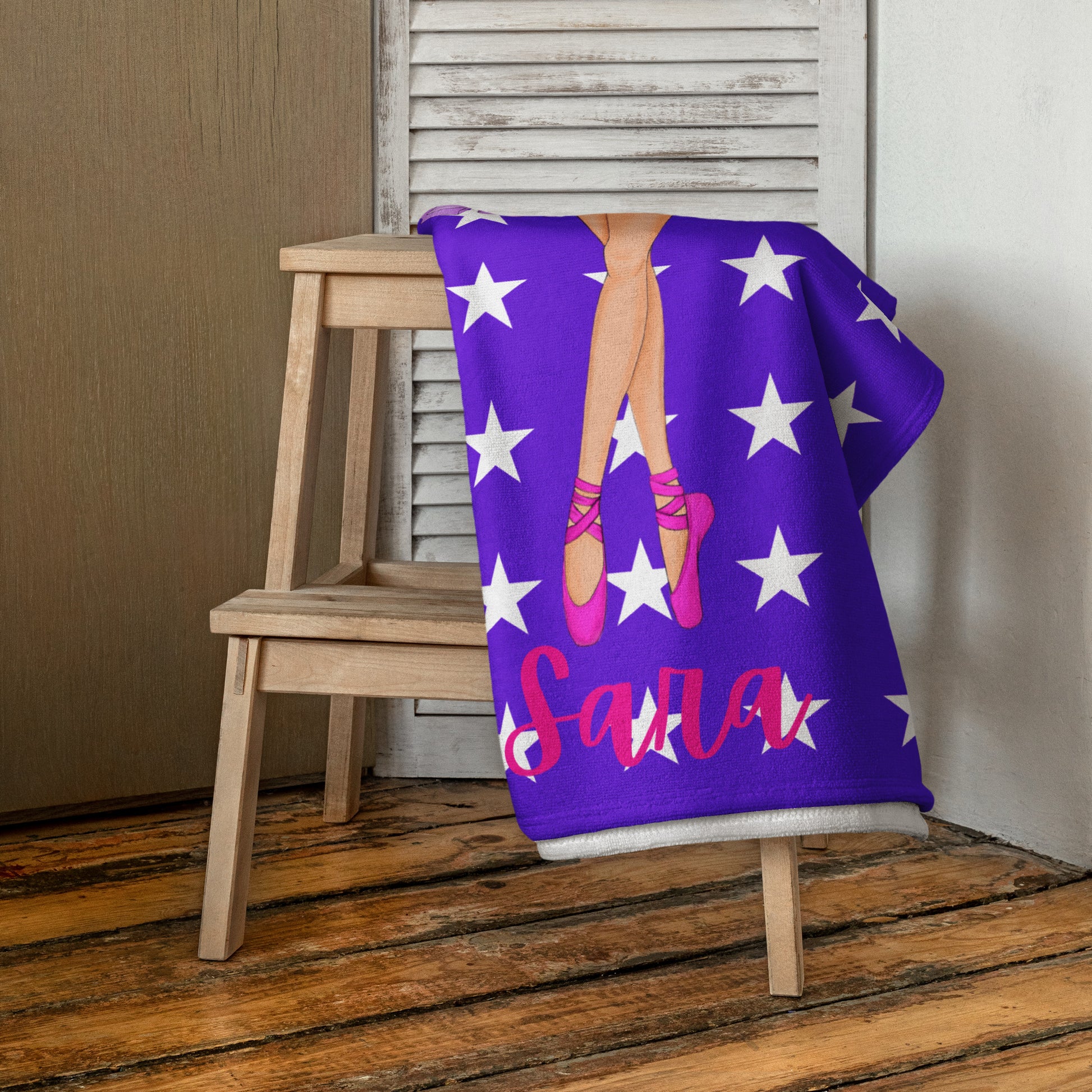 a purple blanket with a picture of a woman's legs on it