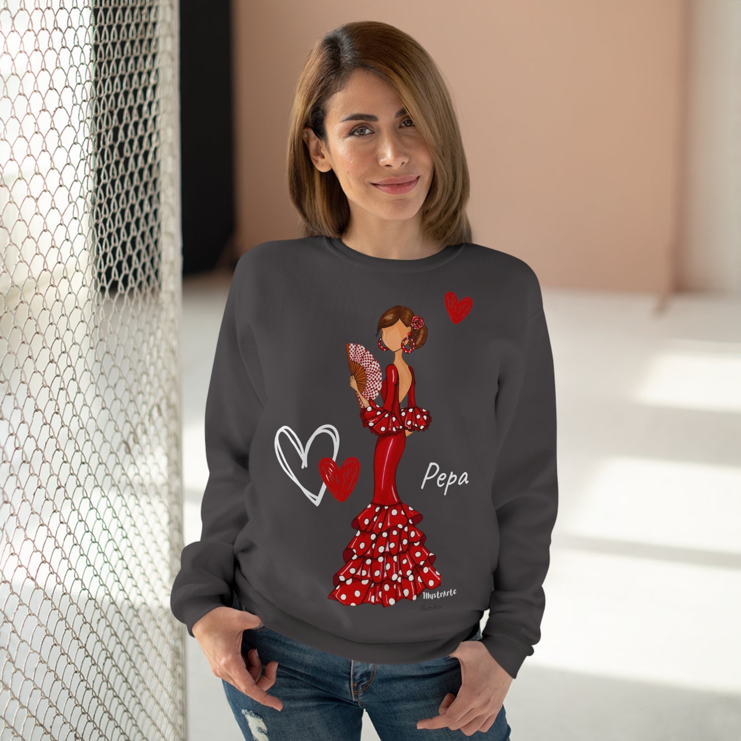 a woman wearing a sweatshirt with a picture of a woman in a polka dot dress