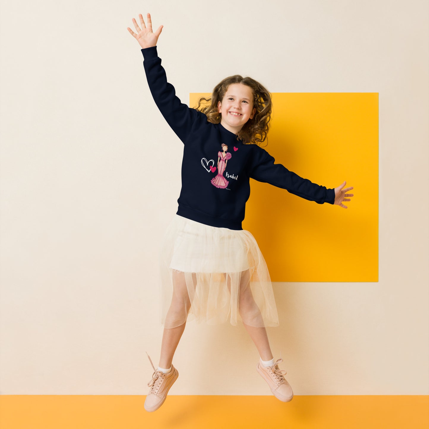 a little girl jumping in the air with her arms in the air
